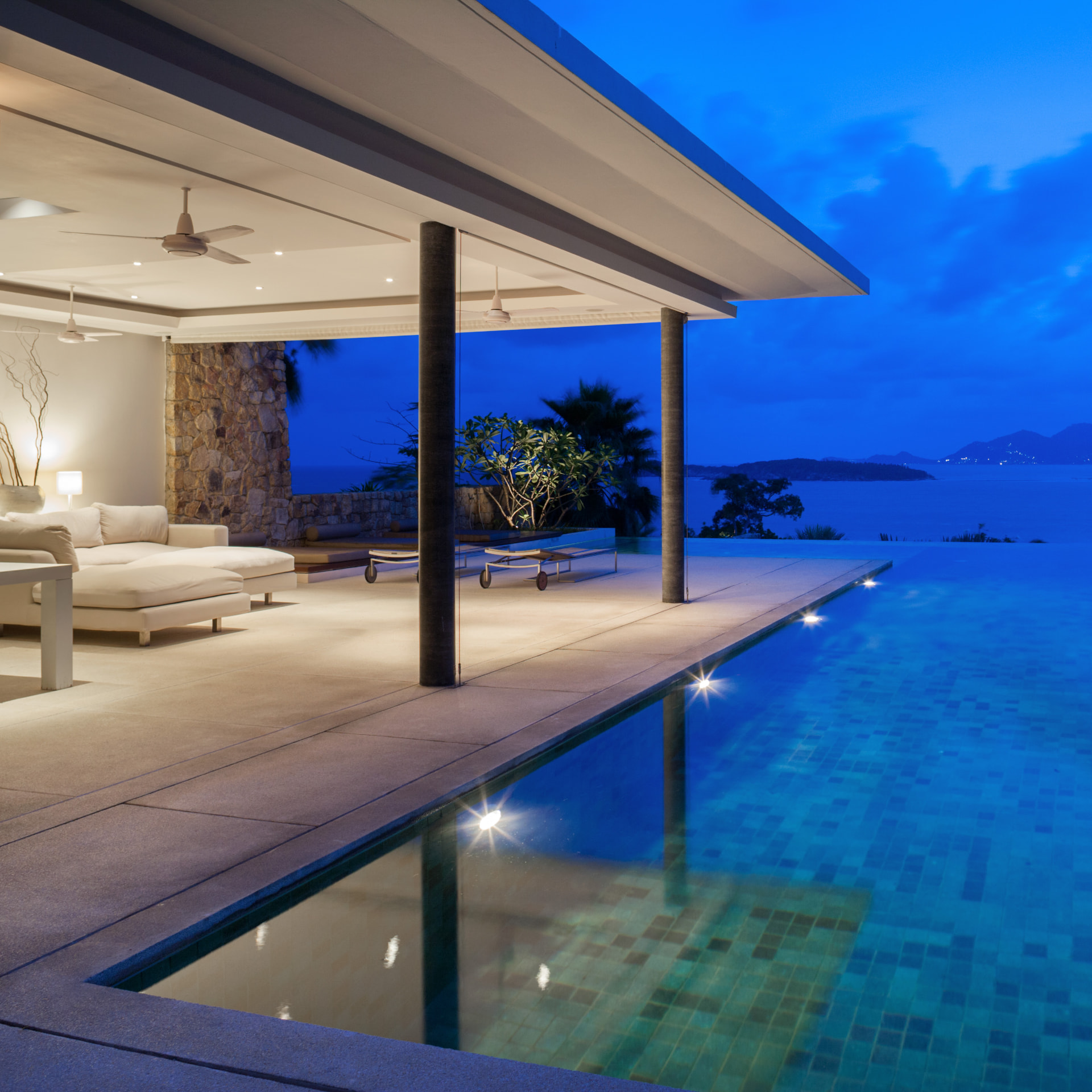Private villa infinity pool at dusk